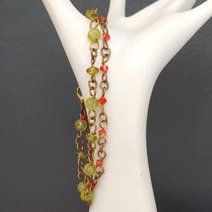 Delicate 2 strand green and orange beaded bracelet